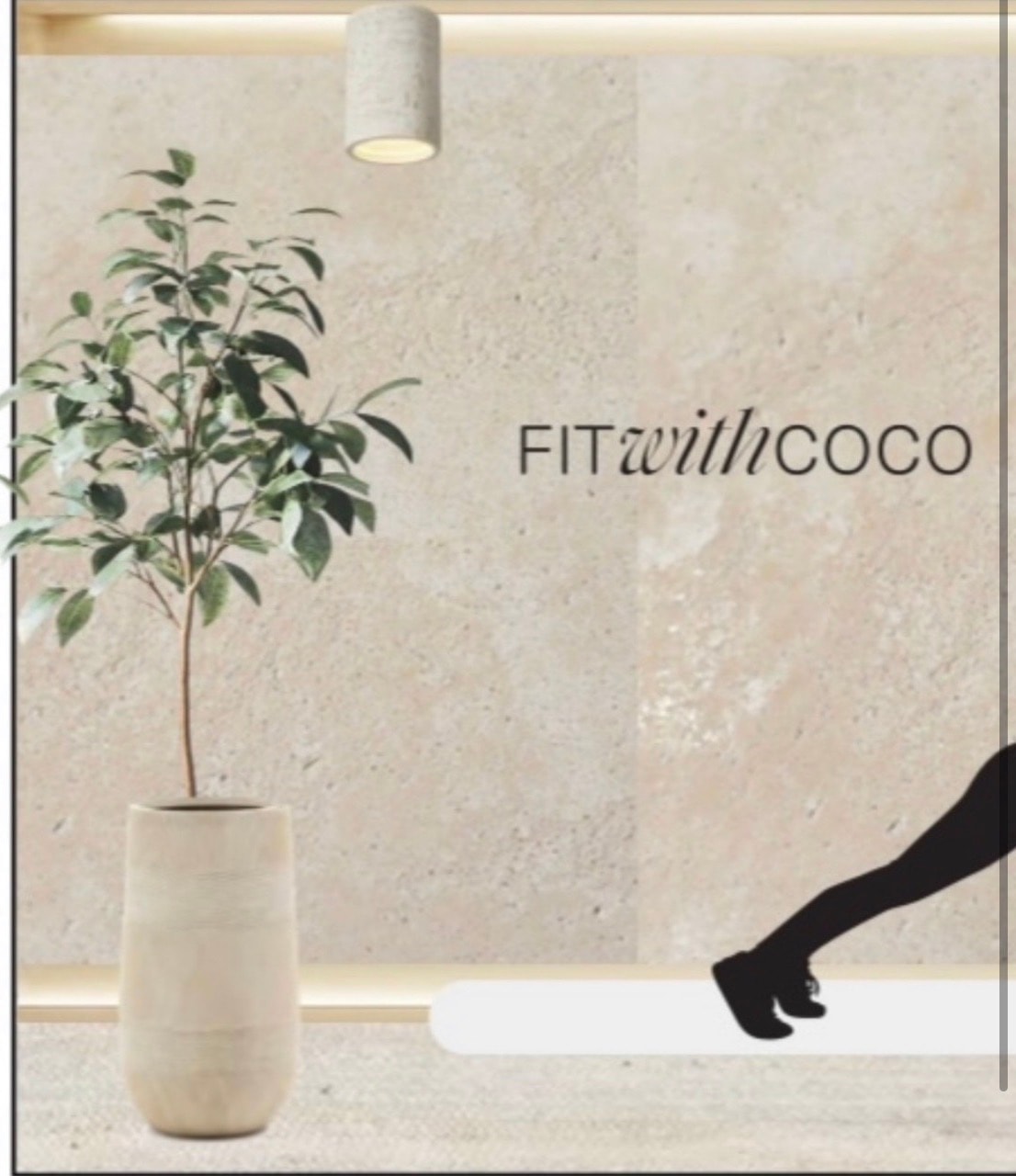 FITwithCOCO fitness studio — travertine-effect decorative plaster commercial feature wall